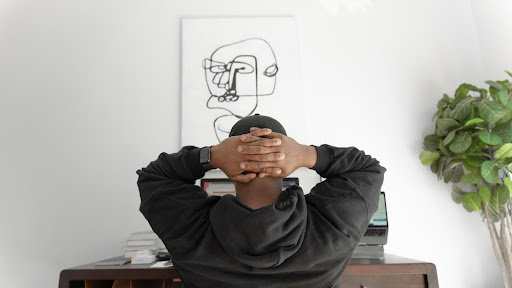 man staring at wall art